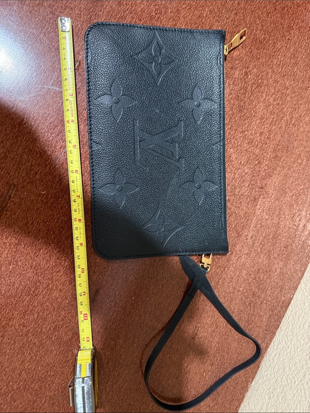 Louis Vuitton black Embossed Leather Wristlet/Clutch